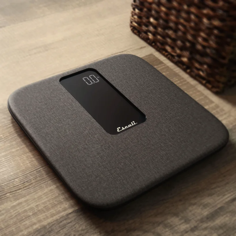 The ComfortStep bathroom scale on a wooden floor